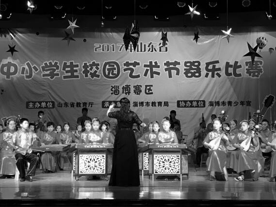 在高中民樂社團中提高學(xué)生音樂學(xué)科素養(yǎng)的研究 在高中民樂社團中提高學(xué)生音樂學(xué)科素養(yǎng)的研究